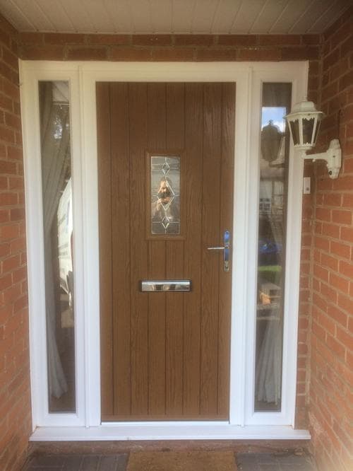 Oak-effect composite door with diamond leaded glass