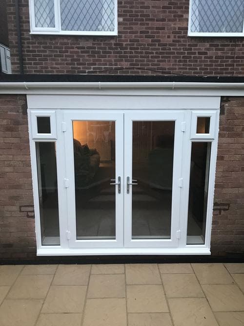 White French doors opening onto a patio