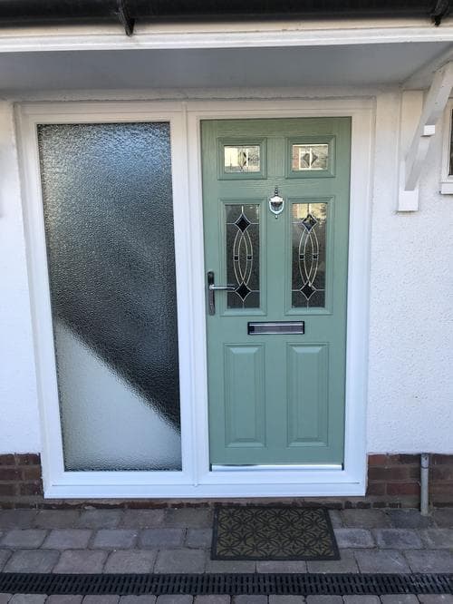 Brown composite door with full-height glazed sidelights