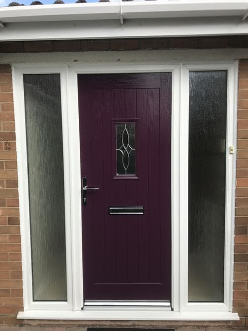 Plum composite door with central diamond glazing and sidelights