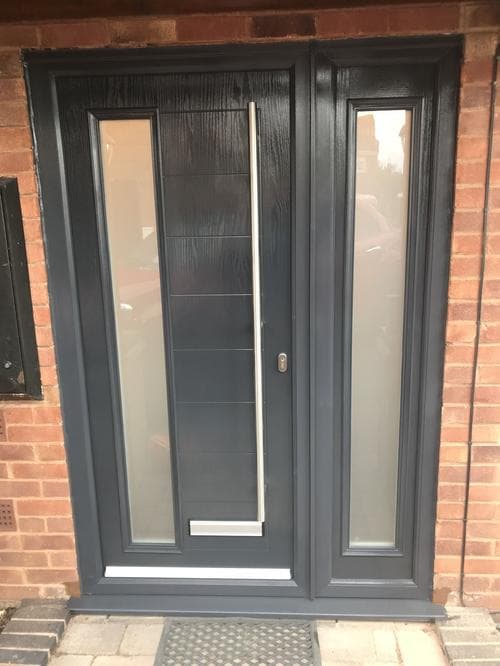 Anthracite composite door with full-length modern handle