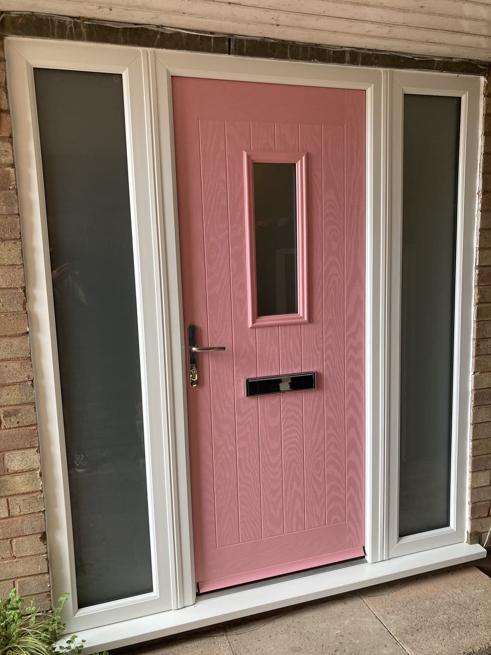 Pink composite front door installation